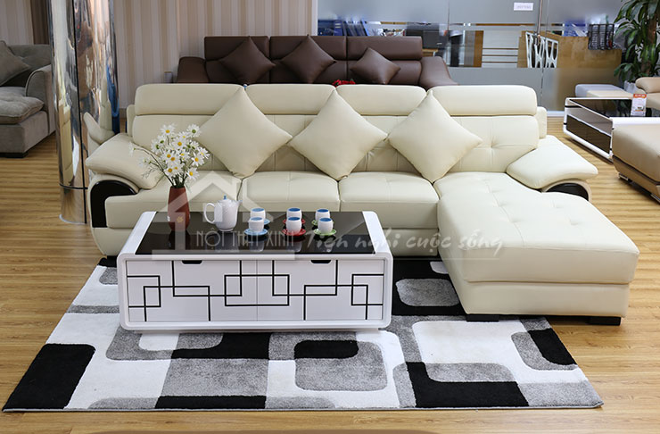 Không gian sống luôn trở nên ấn tượng khi đặt chung cả bàn trà, ghế sofa với thảm