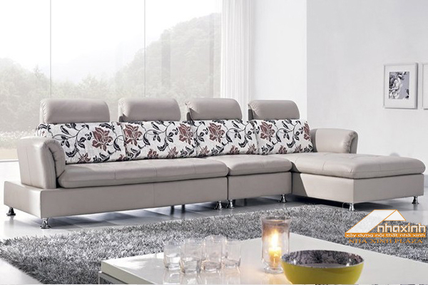 Căn phòng khách với bộ ghế sofa bằng da rất thích hợp cho các gia đình yêu thích không gian ấm cúng