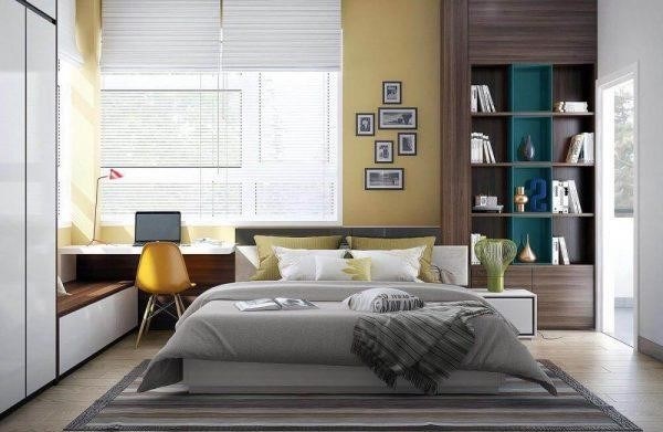 Bộ tủ được thiết kế tích hợp nhiều ngăn chia, kết hợp với ga giường màu xám trung tính tạo ra một ấn tượng tốt.