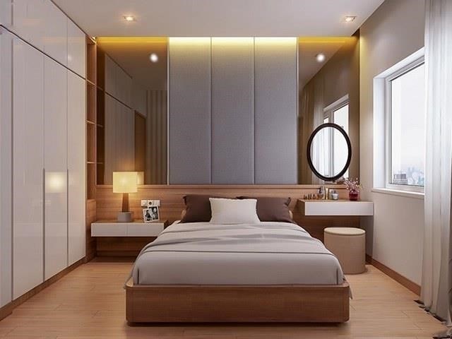 Phòng ngủ được trang trí bằng màu xám tối giản, giúp không gian phòng trở nên rộng rãi và thoải mái hơn.